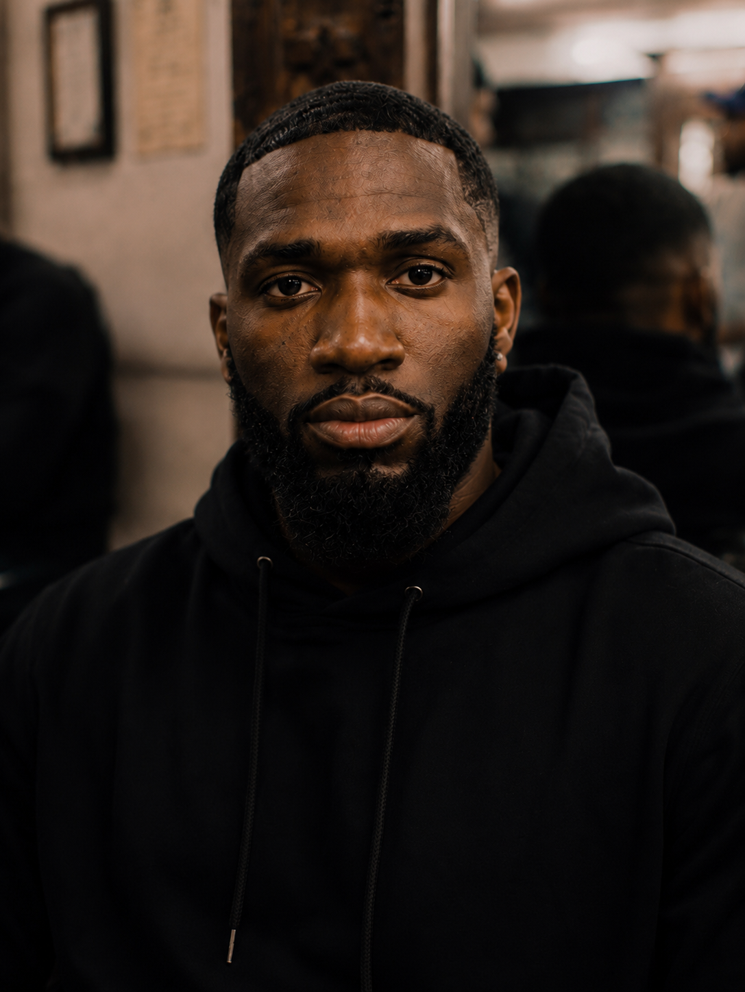 Monochrome editorial portrait of TY RICH, recording artist